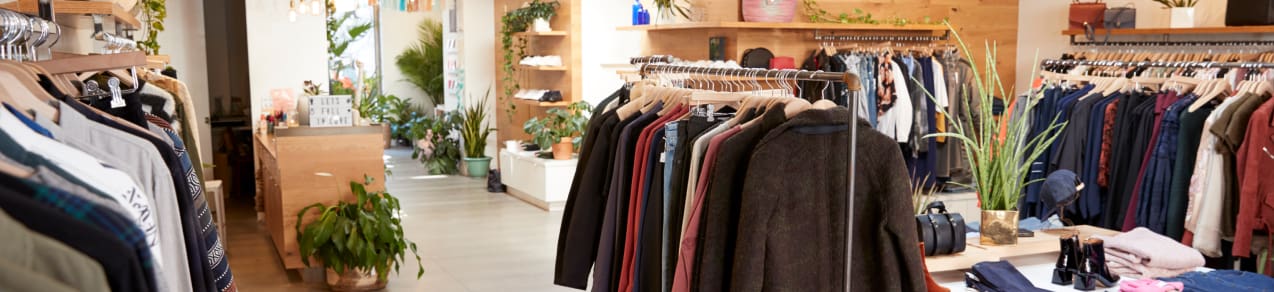 Boutique clothing store with natural wood tones is an example of a business that could use a business owners policy