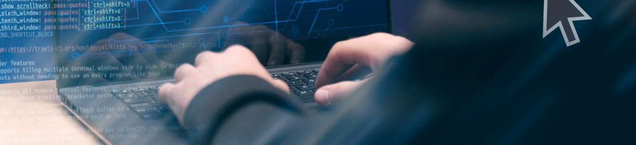 Hands resting on a laptop keyboard with code overlayed in lower left of the image showing a business that could benefit from cyber liability insurance